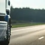 long,vehicle,trailer,truck,on,a,highway.