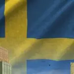 sweden,flag,and,big,stack,of,shipping,cargo,containers,in